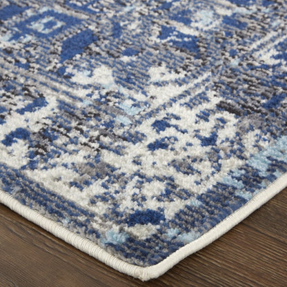 7' X 10' Blue and Ivory Floral Power Loom Distressed Non Skid Area Rug