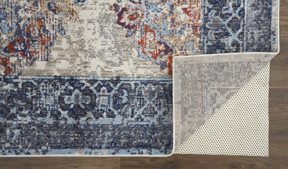 7' X 10' Blue and Ivory Floral Power Loom Distressed Non Skid Area Rug