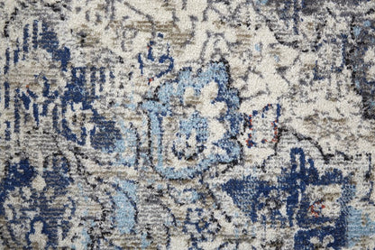7' X 10' Blue and Ivory Floral Power Loom Distressed Non Skid Area Rug