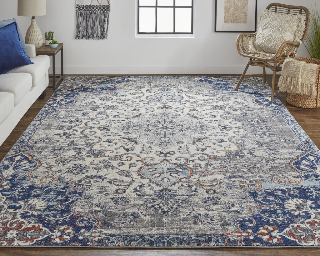 5' X 8' Ivory Gray And Blue Floral Power Loom Distressed Stain Resistant Area Rug