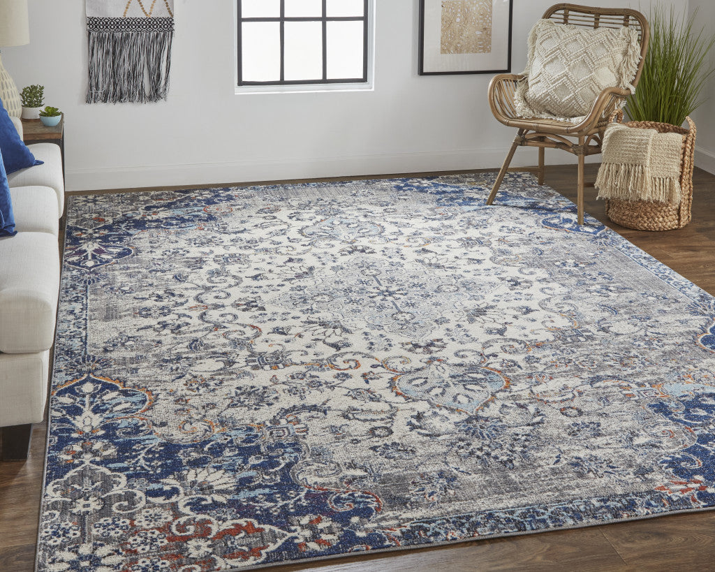 5' X 8' Ivory Gray And Blue Floral Power Loom Distressed Stain Resistant Area Rug