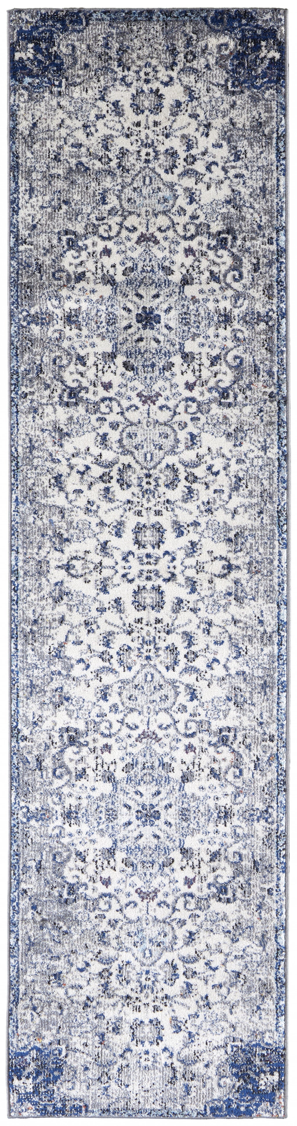 5' X 8' Ivory Gray And Blue Floral Power Loom Distressed Stain Resistant Area Rug