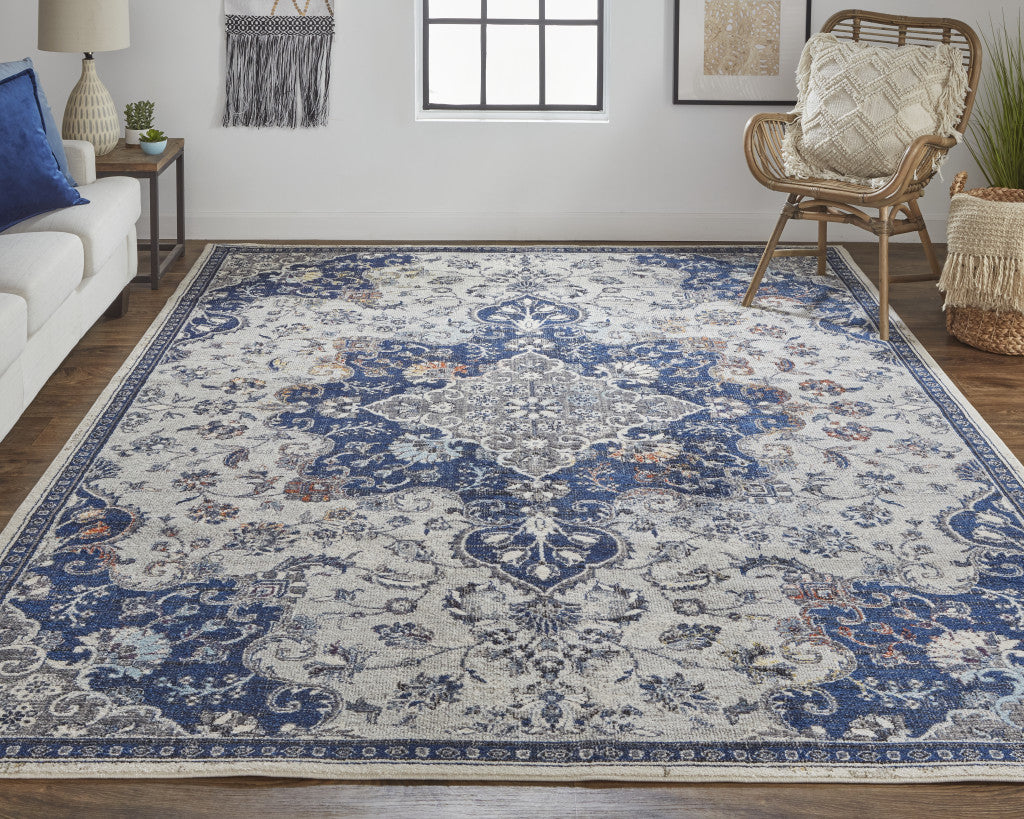 5' X 8' Gray Ivory And Blue Floral Power Loom Distressed Stain Resistant Area Rug