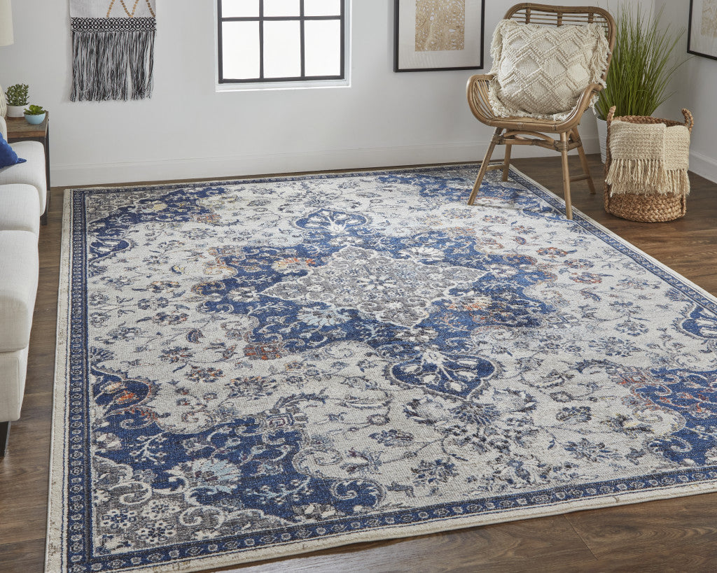 5' X 8' Gray Ivory And Blue Floral Power Loom Distressed Stain Resistant Area Rug