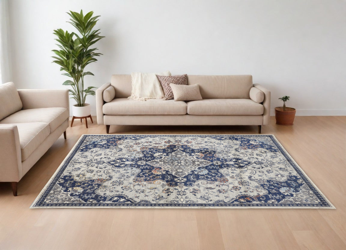 5' X 8' Gray Ivory And Blue Floral Power Loom Distressed Stain Resistant Area Rug