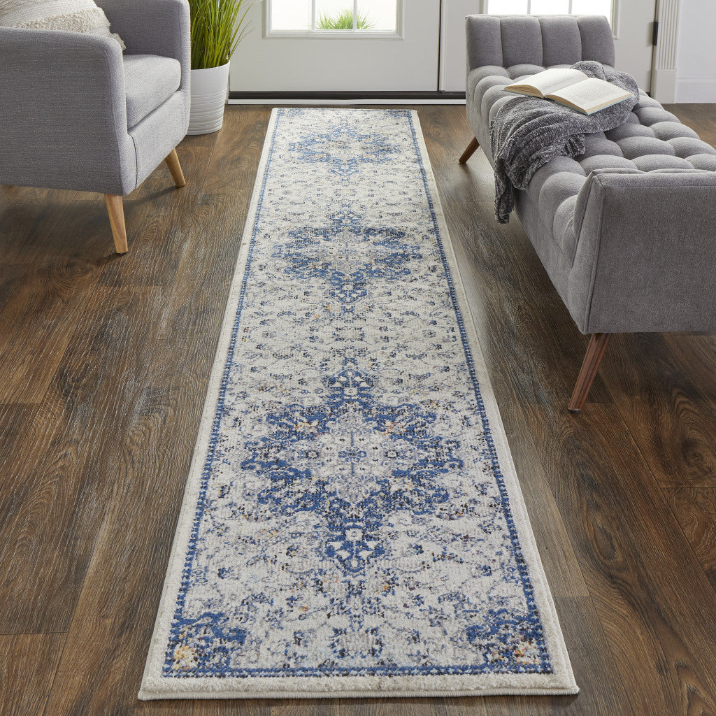 5' X 8' Gray Ivory And Blue Floral Power Loom Distressed Stain Resistant Area Rug