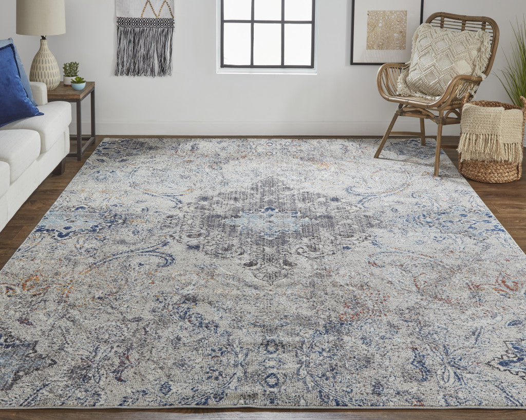 8' X 11' Ivory Taupe And Blue Floral Power Loom Distressed Stain Resistant Area Rug