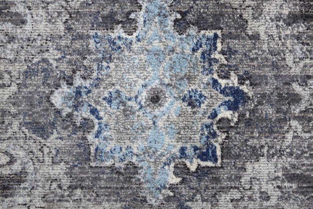 9' X 12' Ivory Taupe And Blue Floral Power Loom Distressed Stain Resistant Area Rug