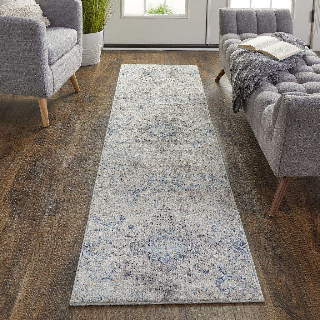 9' X 12' Ivory Taupe And Blue Floral Power Loom Distressed Stain Resistant Area Rug