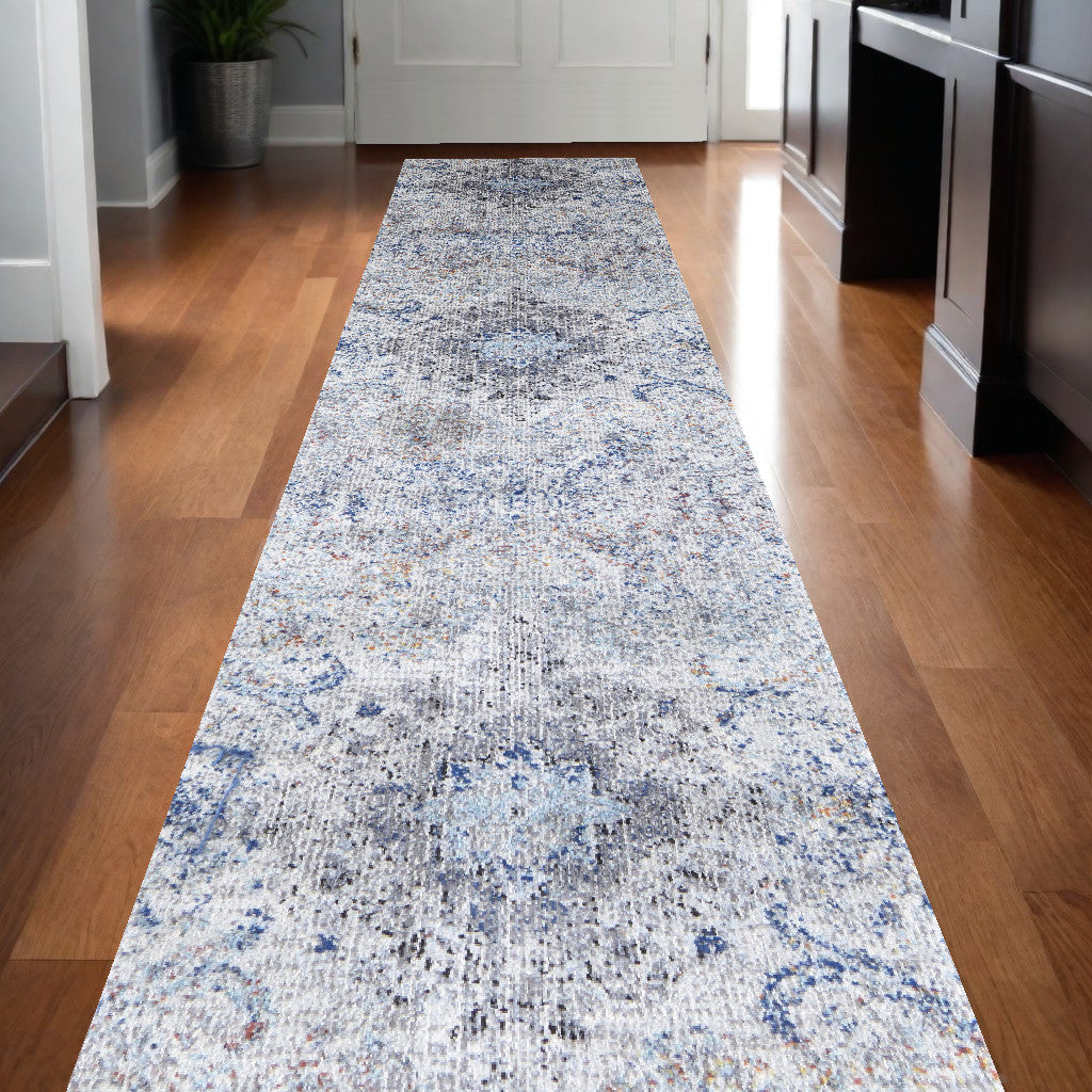 9' X 12' Ivory Taupe And Blue Floral Power Loom Distressed Stain Resistant Area Rug