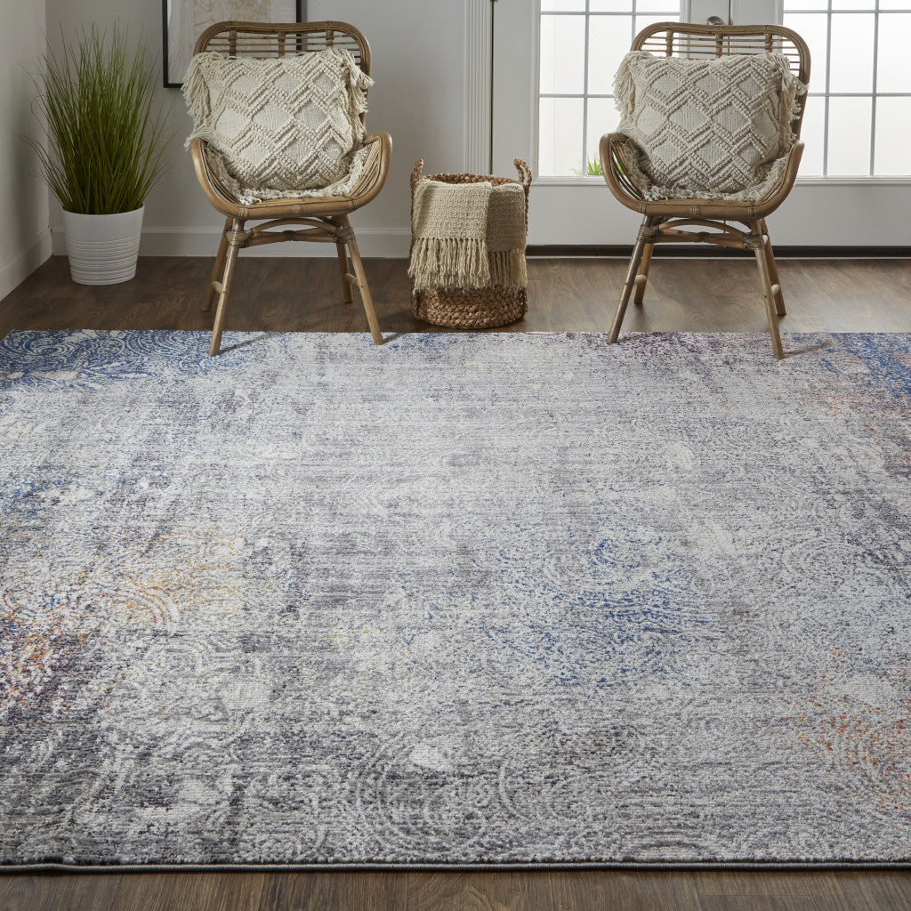 5' X 8' Taupe Blue And Ivory Abstract Power Loom Distressed Stain Resistant Area Rug