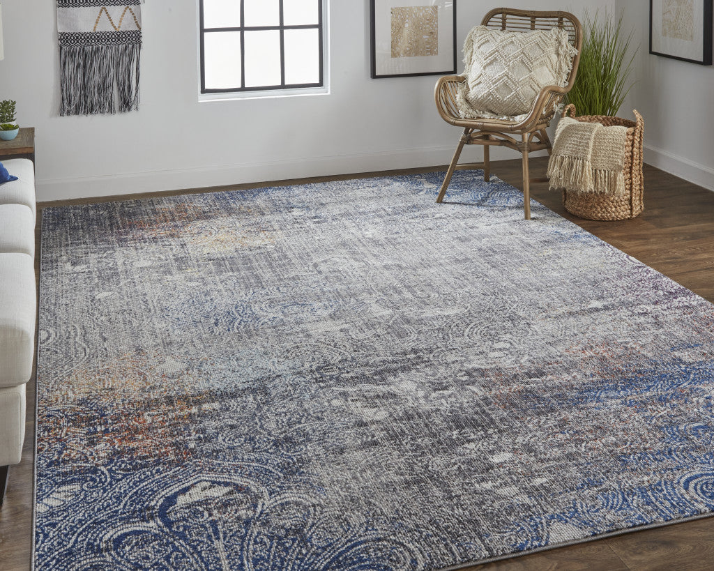 5' X 8' Taupe Blue And Ivory Abstract Power Loom Distressed Stain Resistant Area Rug