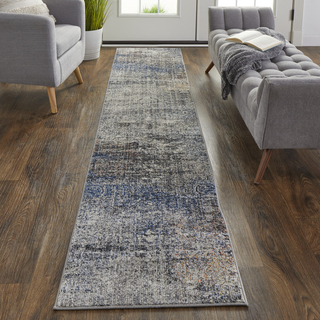 7' X 10' Taupe Blue And Ivory Abstract Power Loom Distressed Stain Resistant Area Rug