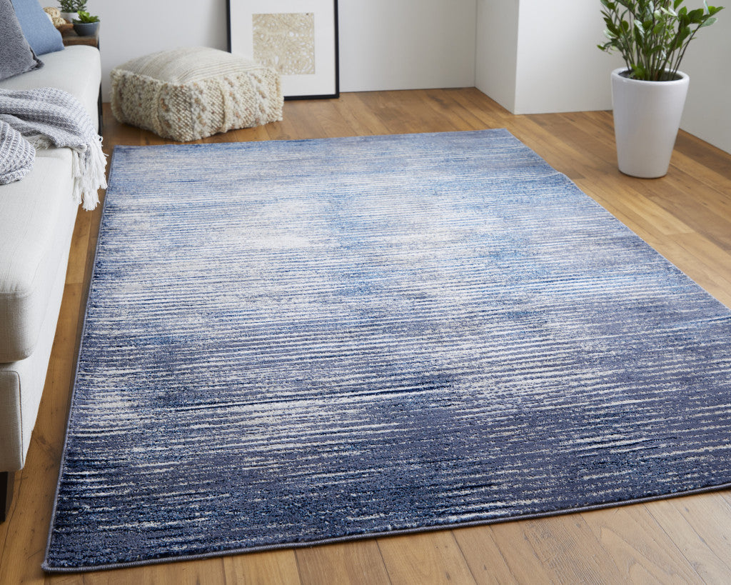 5' X 8' Blue and Ivory Striped Power Loom Distressed Non Skid Area Rug