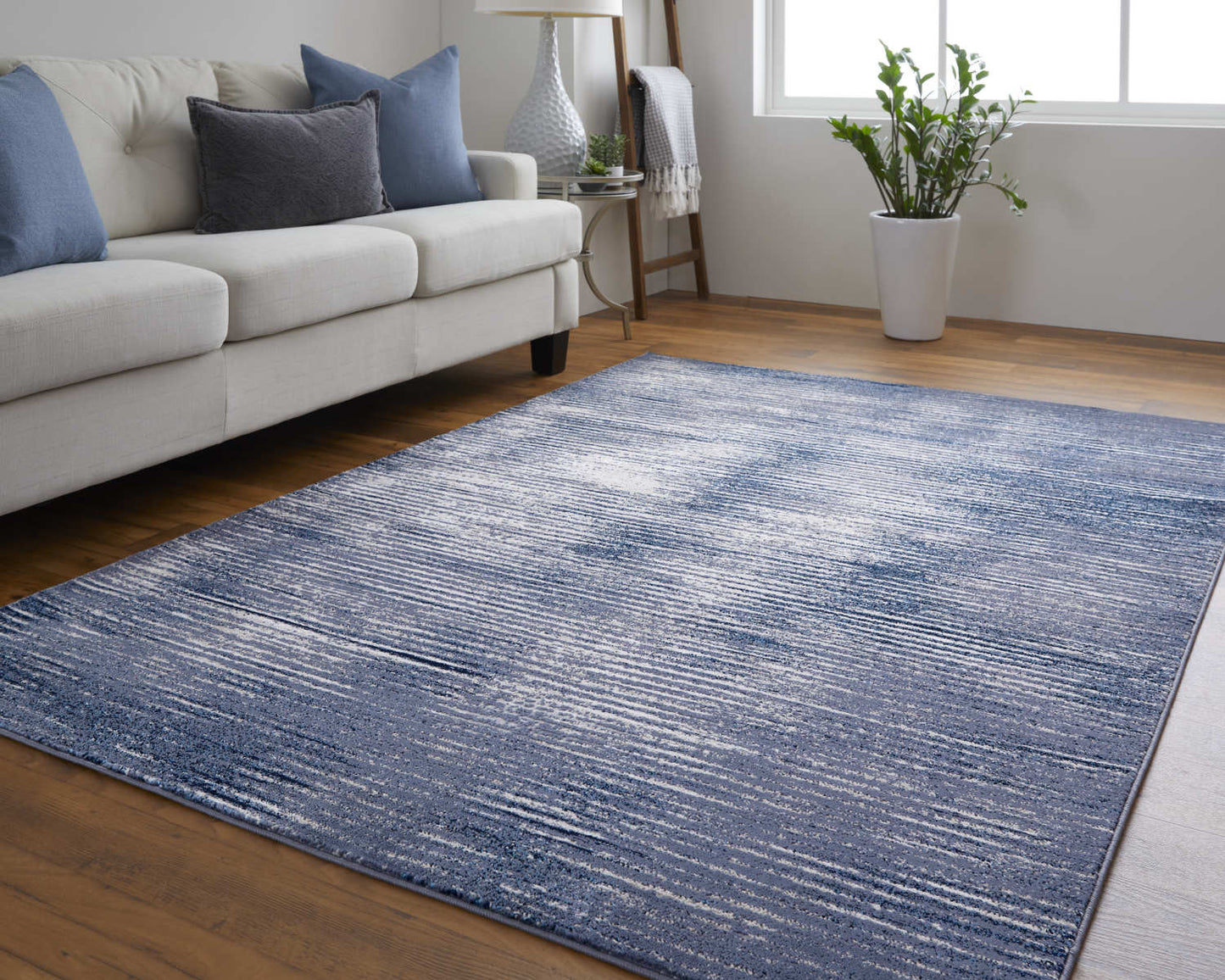 5' X 8' Blue Gray And Ivory Striped Power Loom Distressed Area Rug