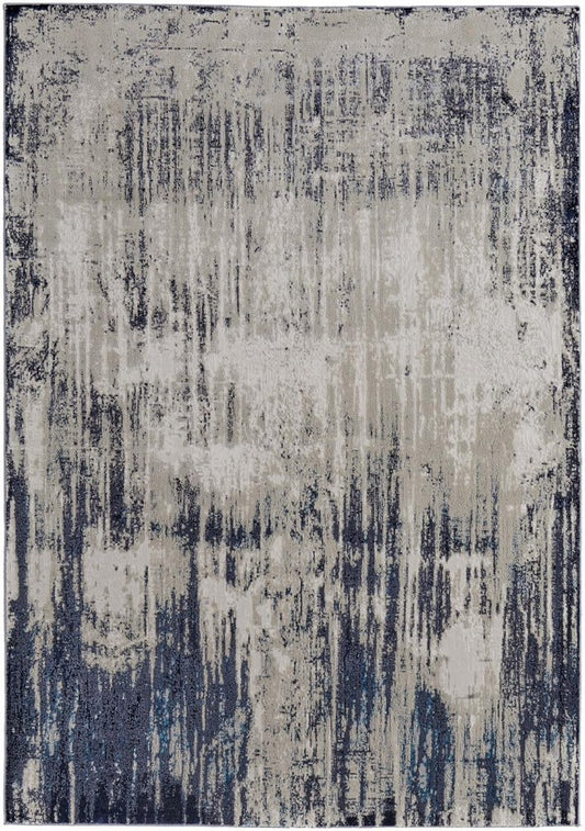 9' X 12' Tan Blue And Ivory Abstract Power Loom Distressed Area Rug