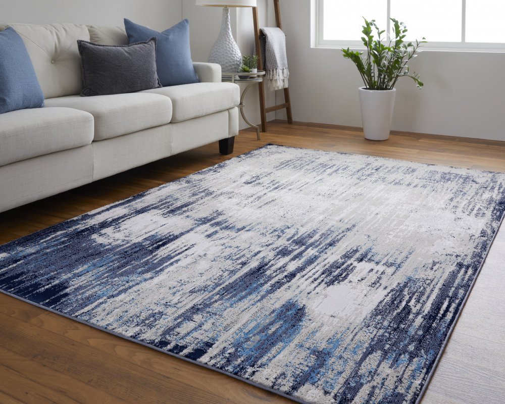 8' X 10' Tan and Blue Abstract Power Loom Distressed Non Skid Area Rug