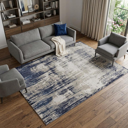 4' X 6' Tan Blue And Ivory Abstract Power Loom Distressed Area Rug