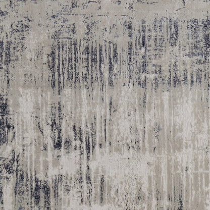 4' X 6' Tan Blue And Ivory Abstract Power Loom Distressed Area Rug