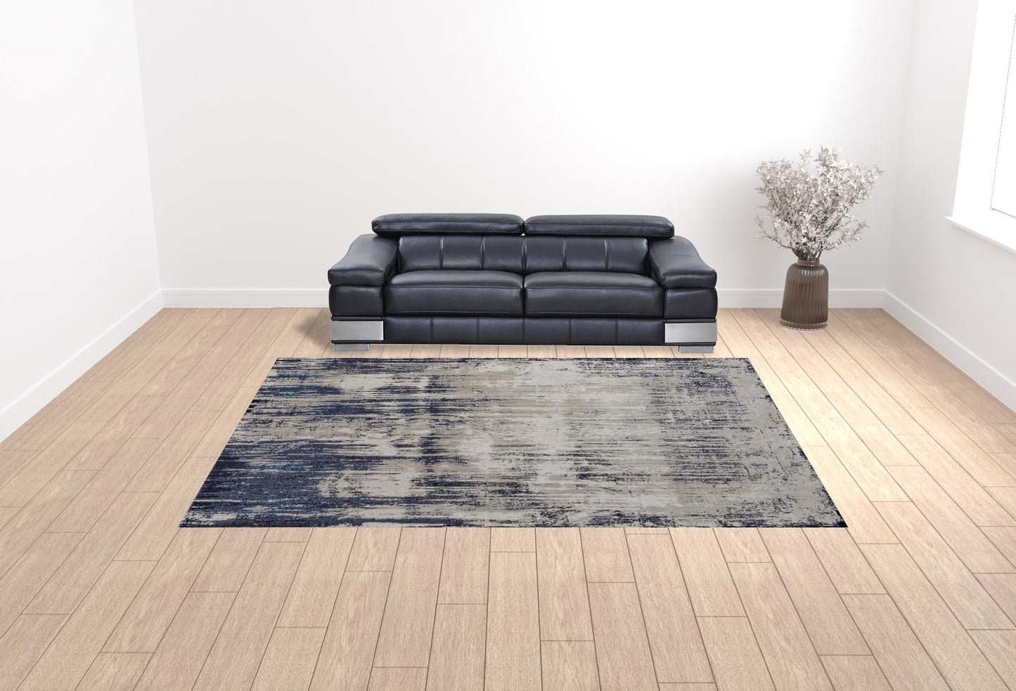 4' X 6' Tan Blue And Ivory Abstract Power Loom Distressed Area Rug