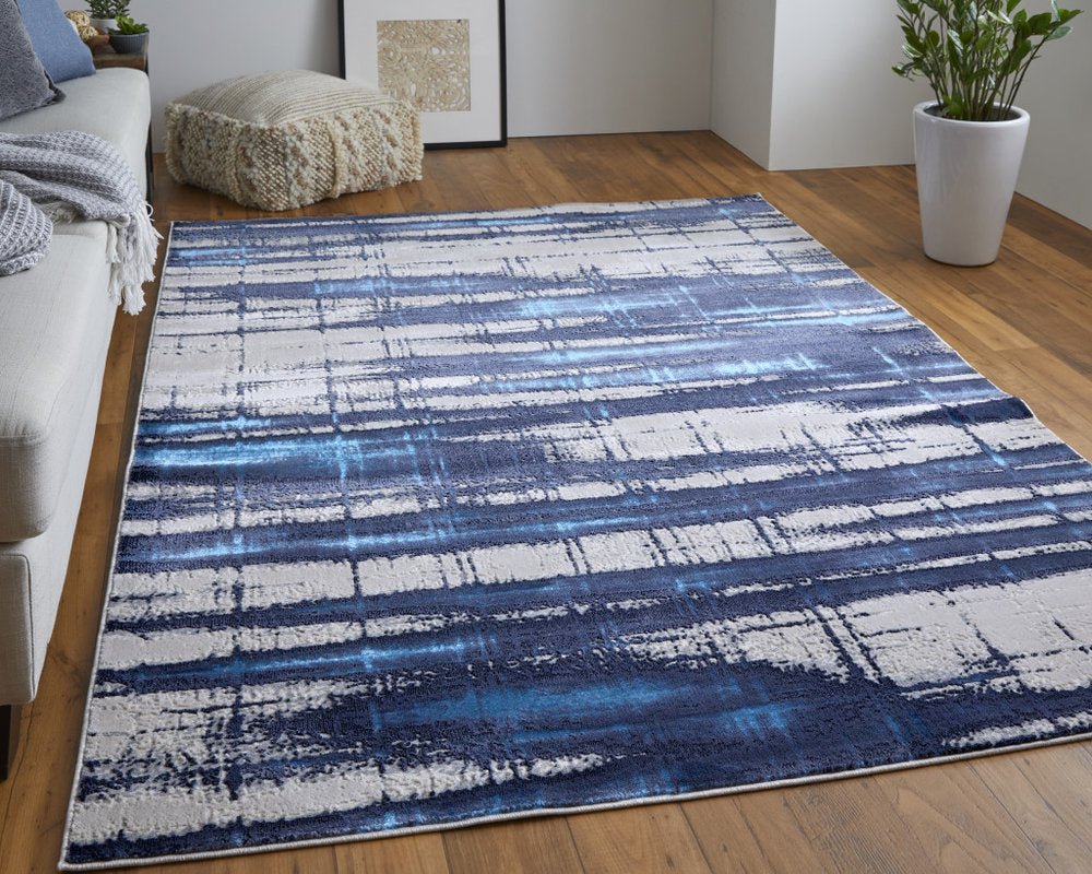 7' X 10' Ivory and Blue Abstract Power Loom Distressed Non Skid Area Rug
