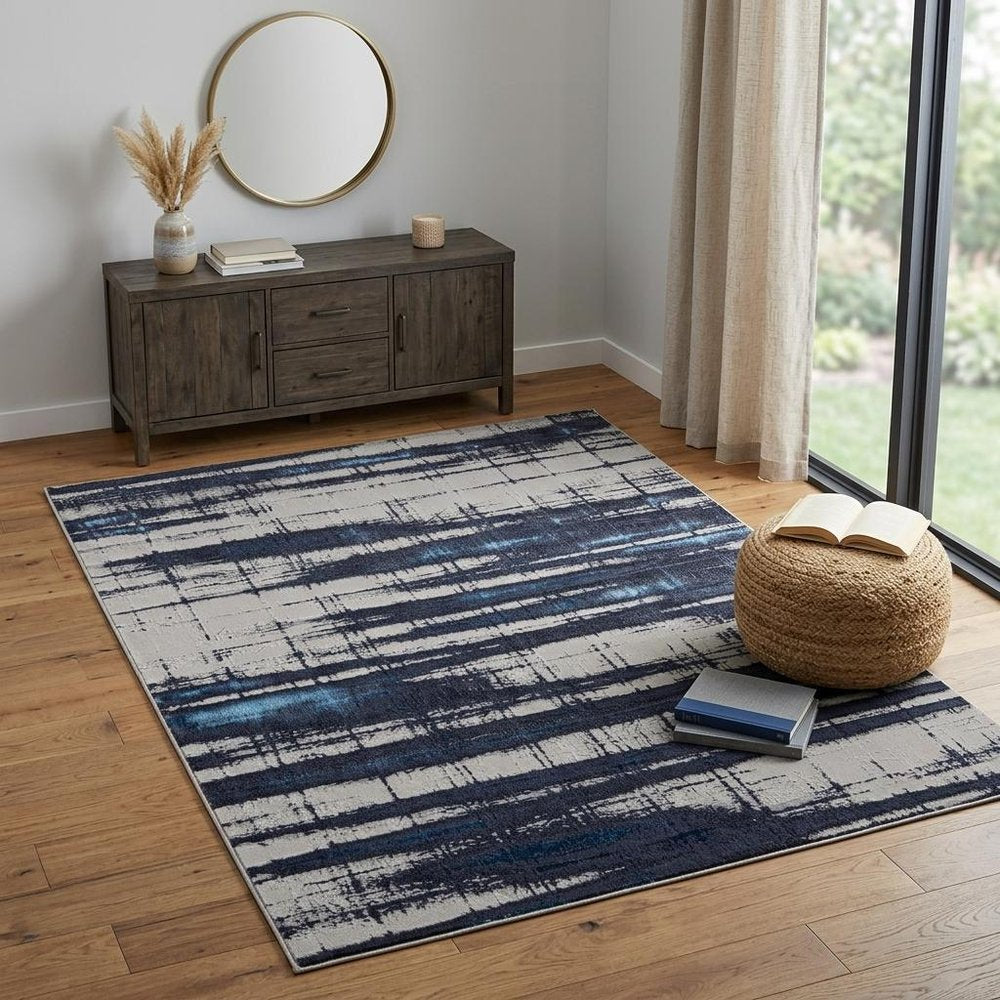 7' X 10' Ivory and Blue Abstract Power Loom Distressed Non Skid Area Rug