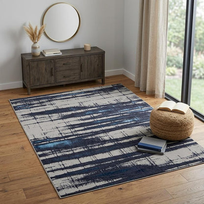 7' X 10' Ivory and Blue Abstract Power Loom Distressed Non Skid Area Rug