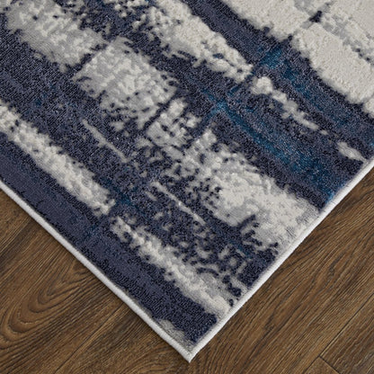 7' X 10' Ivory and Blue Abstract Power Loom Distressed Non Skid Area Rug