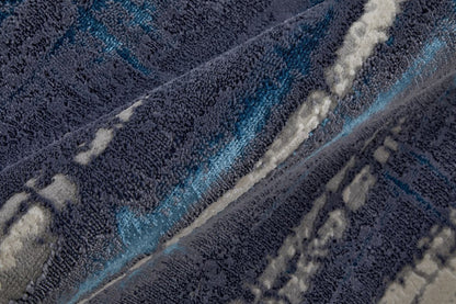 7' X 10' Ivory and Blue Abstract Power Loom Distressed Non Skid Area Rug