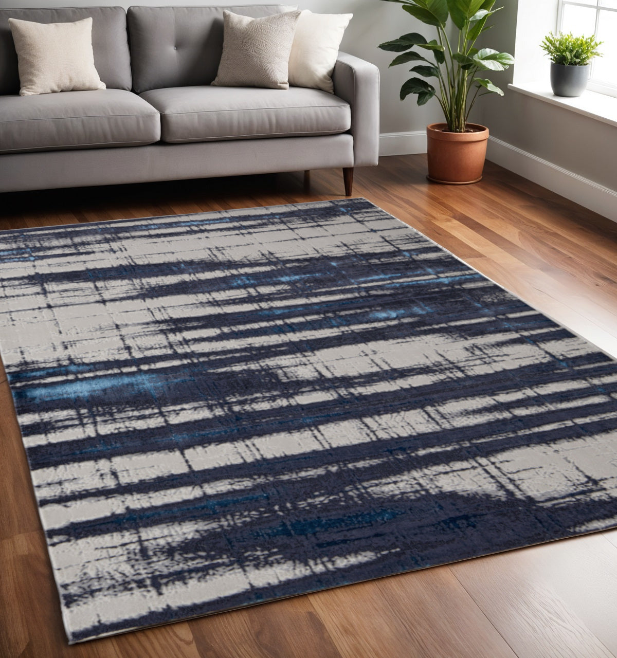 4' X 6' Ivory and Blue Abstract Power Loom Distressed Non Skid Area Rug