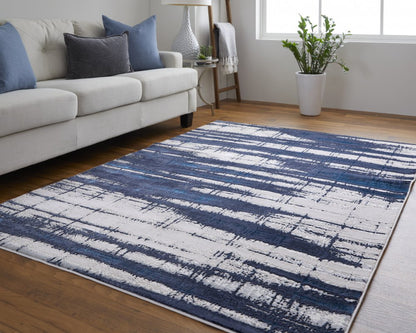 7' X 10' Ivory and Blue Abstract Power Loom Distressed Non Skid Area Rug