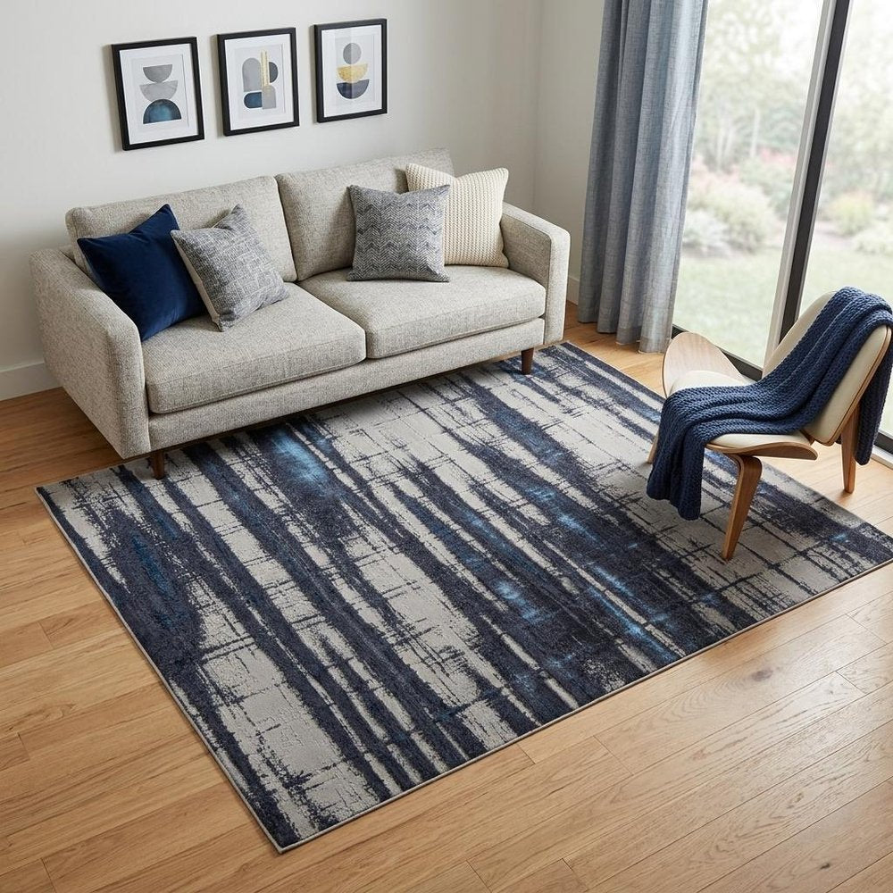 7' X 10' Ivory and Blue Abstract Power Loom Distressed Non Skid Area Rug