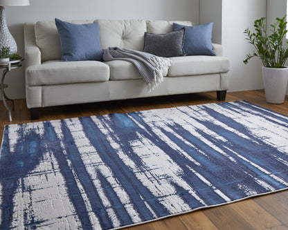 7' X 10' Ivory and Blue Abstract Power Loom Distressed Non Skid Area Rug