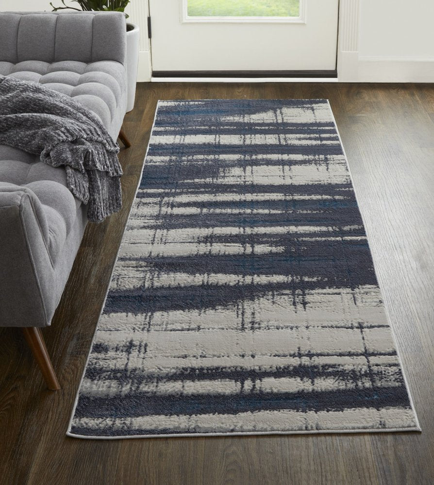 7' X 10' Ivory and Blue Abstract Power Loom Distressed Non Skid Area Rug