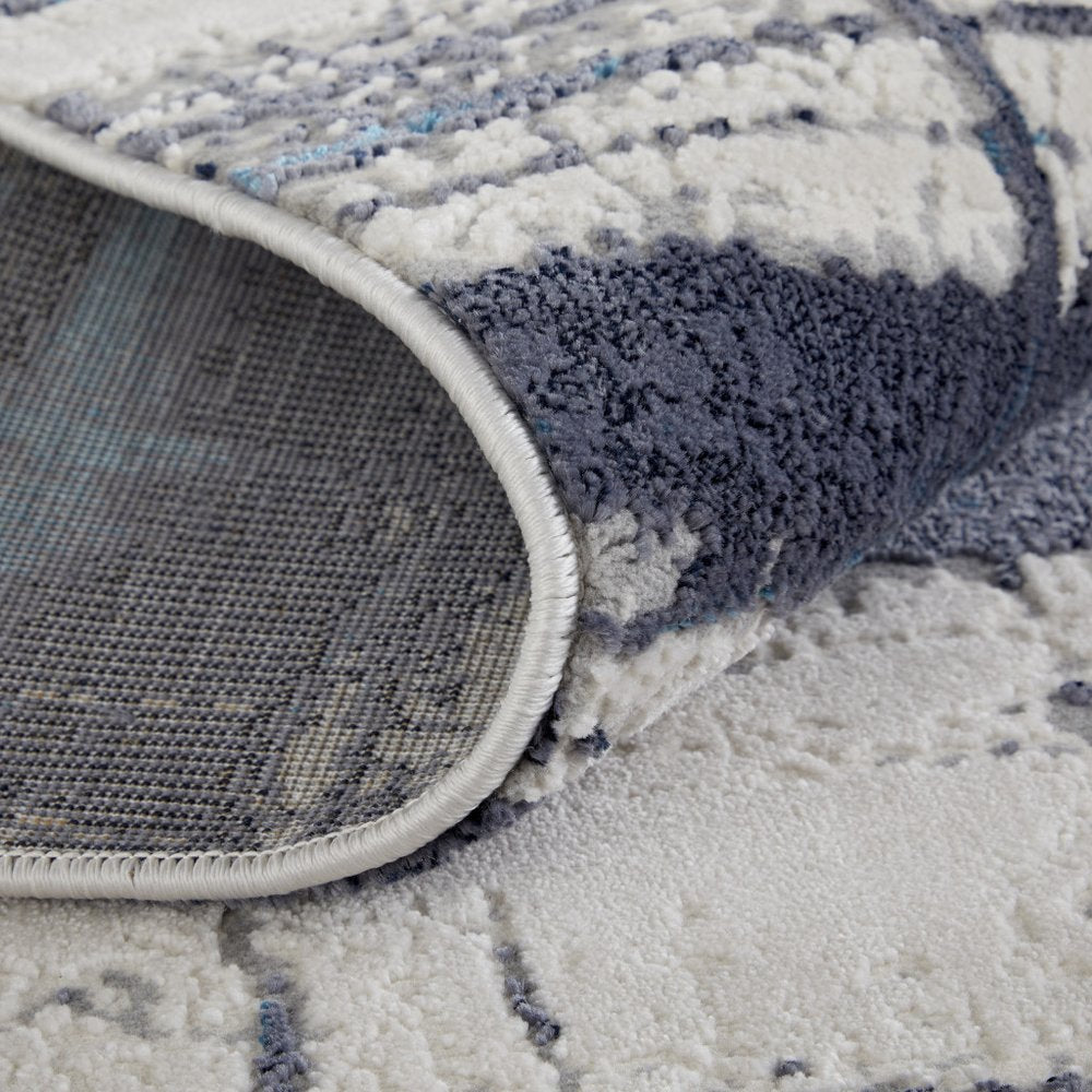 7' X 10' Ivory and Blue Abstract Power Loom Distressed Non Skid Area Rug