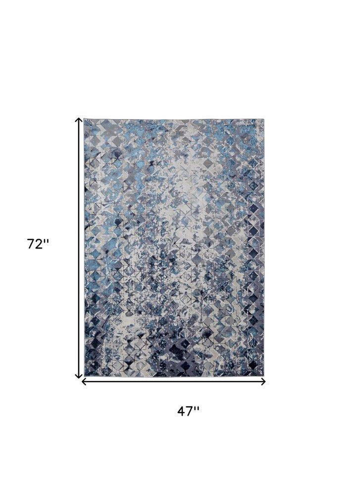 5' X 8' Blue Ivory And Gray Geometric Distressed Area Rug