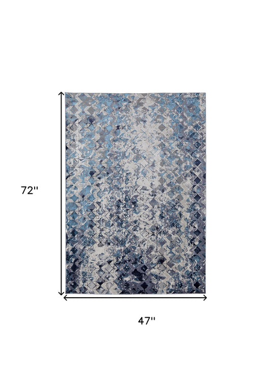 5' X 8' Blue Ivory And Gray Geometric Power Loom Distressed Area Rug