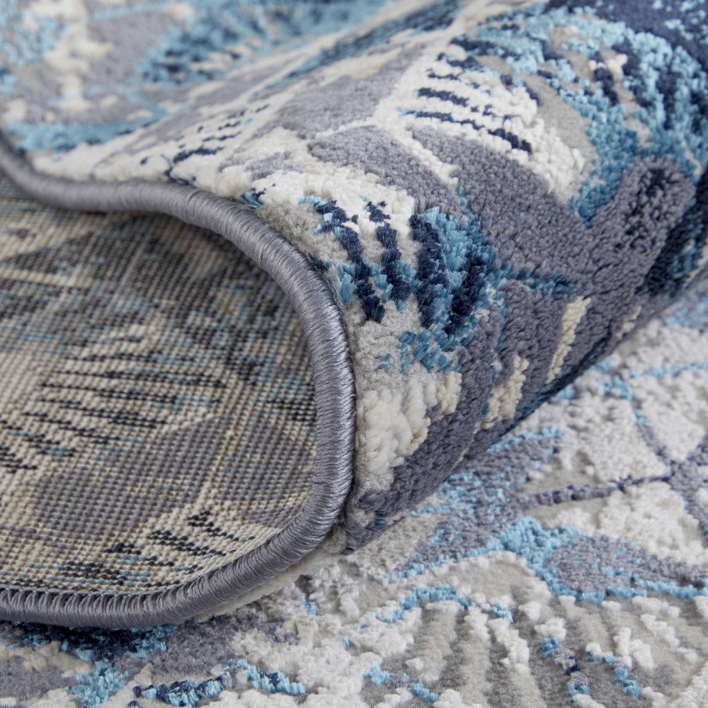 5' X 8' Blue Ivory And Gray Geometric Distressed Area Rug