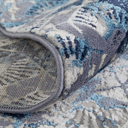 5' X 8' Blue Ivory And Gray Geometric Distressed Area Rug