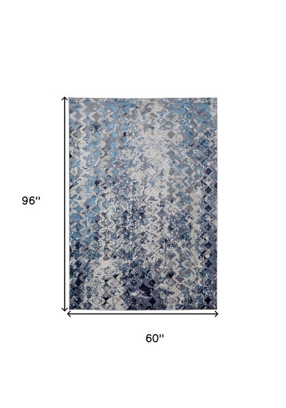 4' X 6' Blue Ivory And Gray Geometric Distressed Area Rug