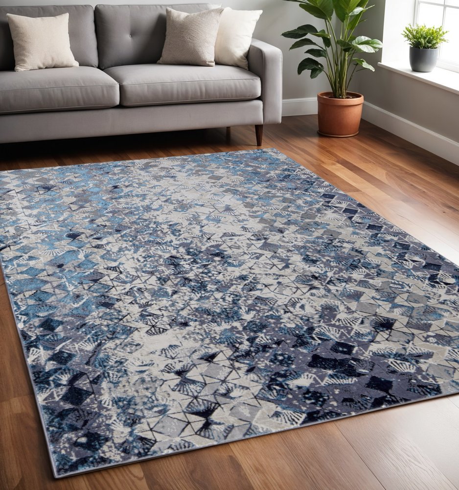 5' X 8' Blue Ivory And Gray Geometric Distressed Area Rug