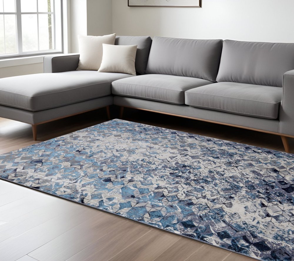 5' X 8' Blue Ivory And Gray Geometric Distressed Area Rug