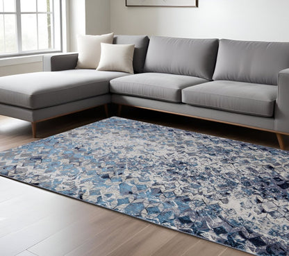 5' X 8' Blue Ivory And Gray Geometric Distressed Area Rug