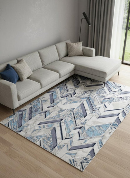 5' X 8' Ivory Blue And Gray Chevron Power Loom Distressed Area Rug