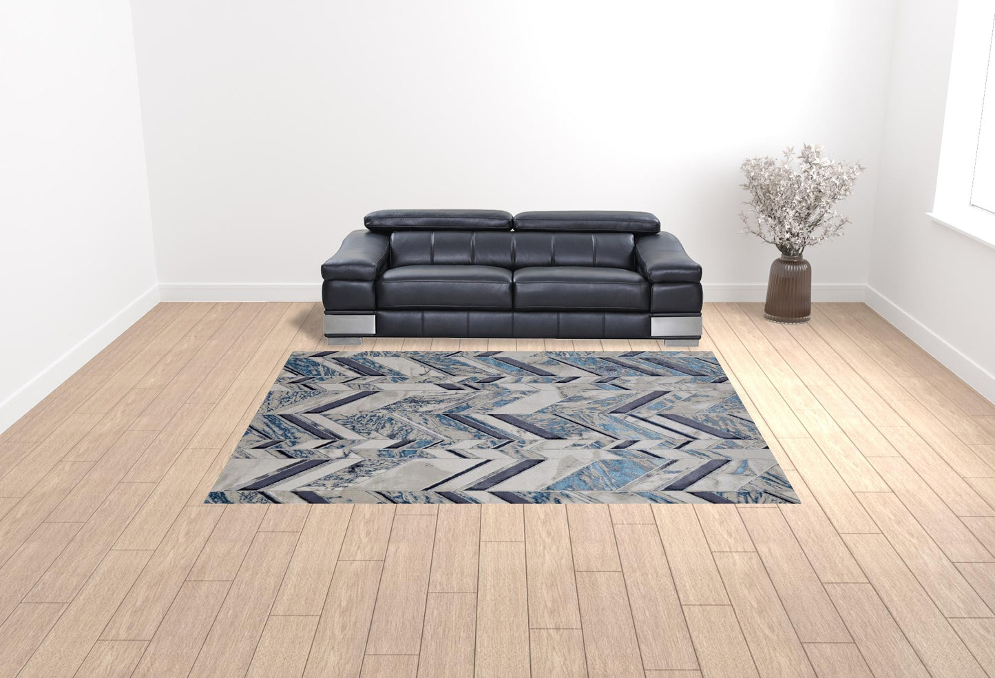 5' X 8' Ivory Blue And Gray Chevron Power Loom Distressed Area Rug