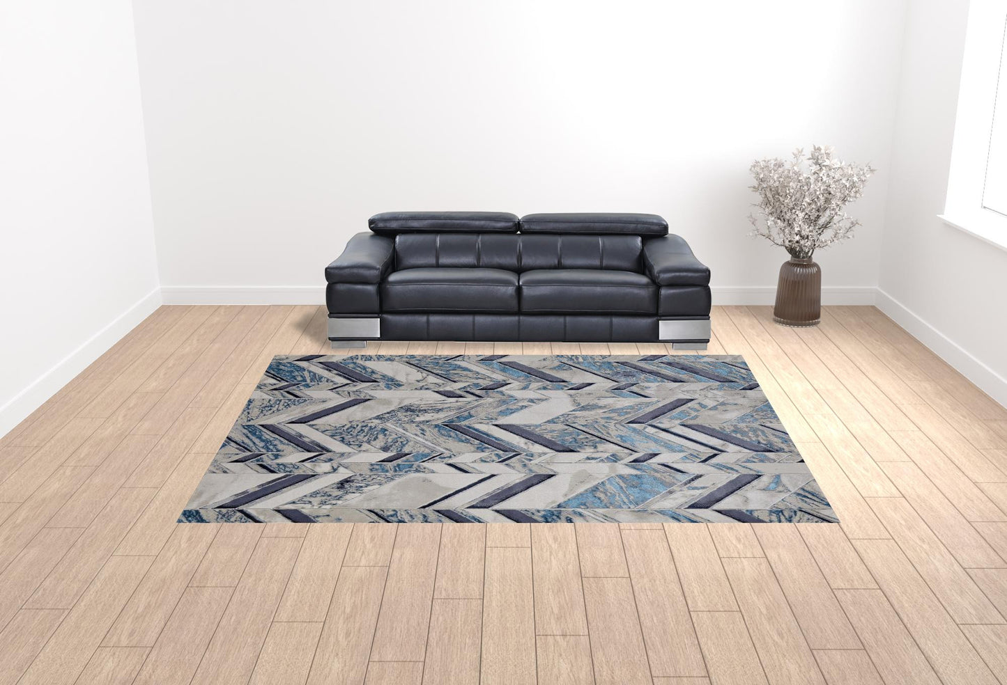 5' X 8' Ivory Blue And Gray Chevron Power Loom Distressed Area Rug