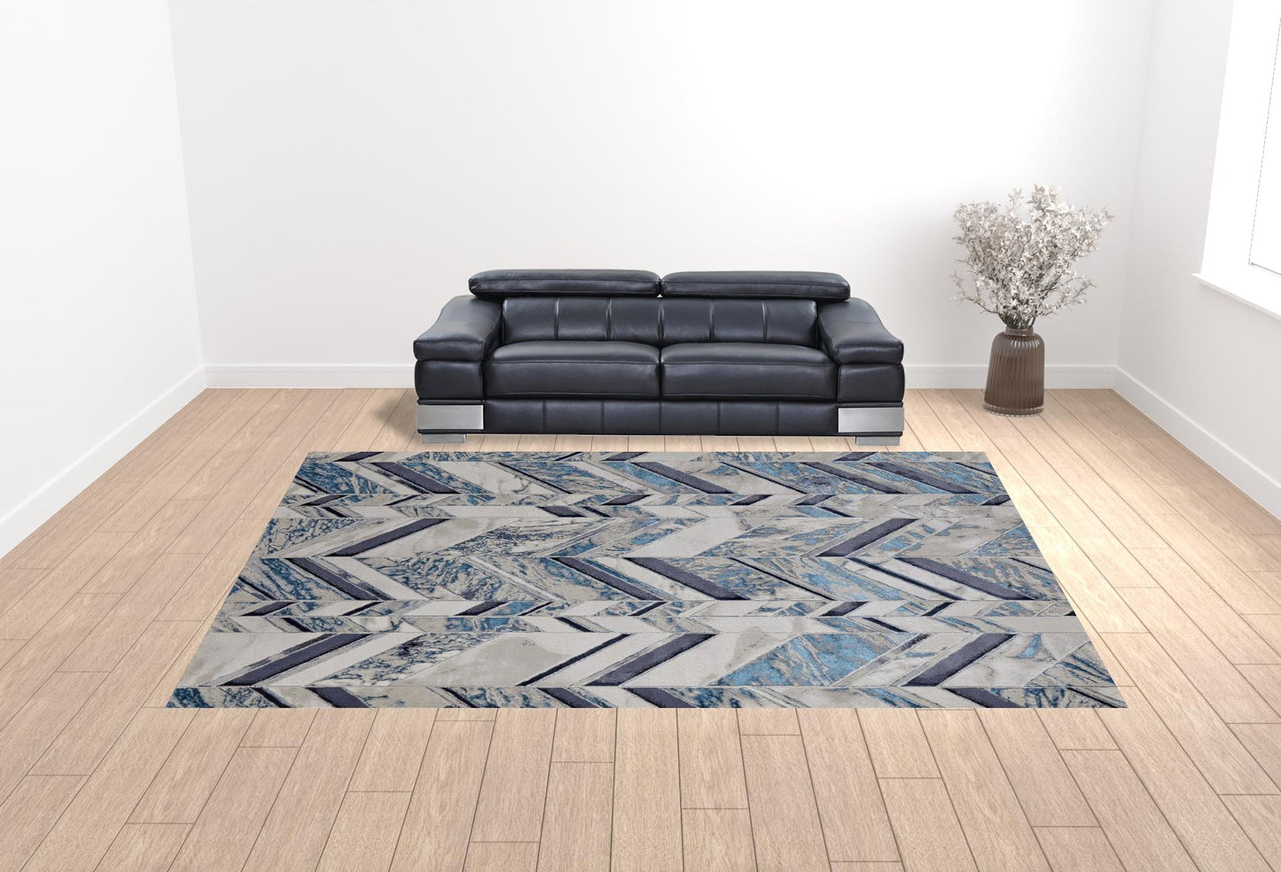 5' X 8' Ivory Blue And Gray Chevron Power Loom Distressed Area Rug