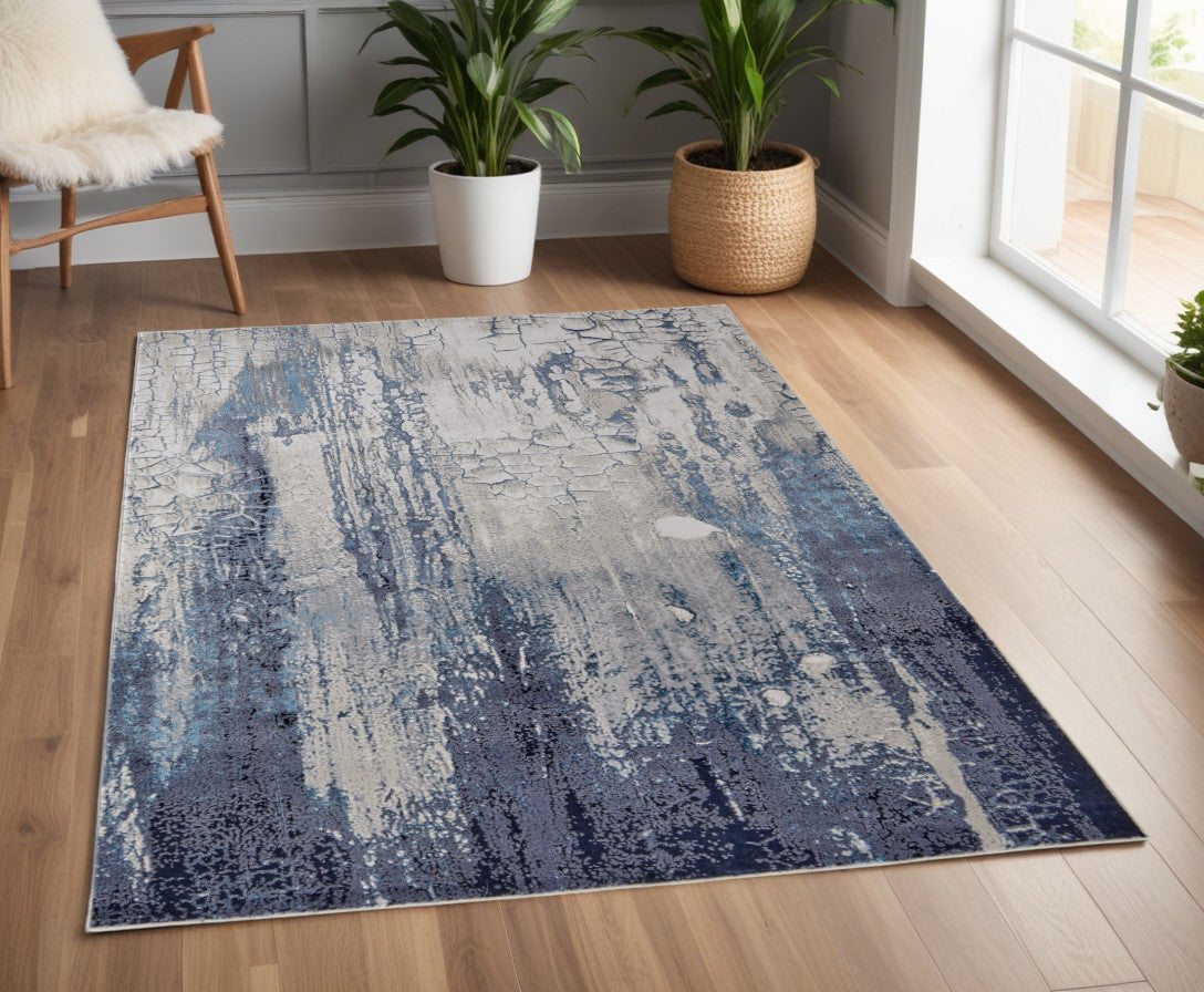 4' X 6' Ivory and Blue Abstract Power Loom Distressed Non Skid Area Rug