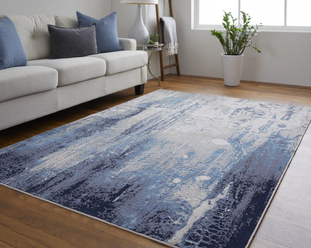 9' X 12' Ivory Blue And Black Abstract Power Loom Distressed Area Rug