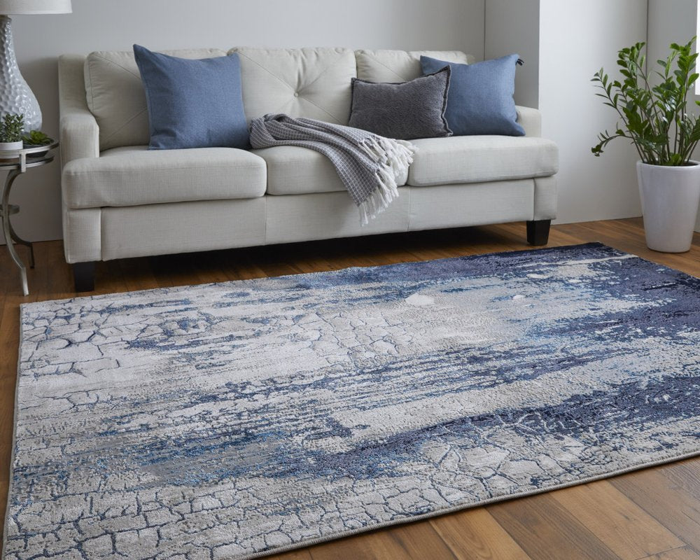 4' X 6' Ivory and Blue Abstract Power Loom Distressed Non Skid Area Rug